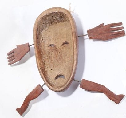 Anthropomorphic decorative mask with an oval...
