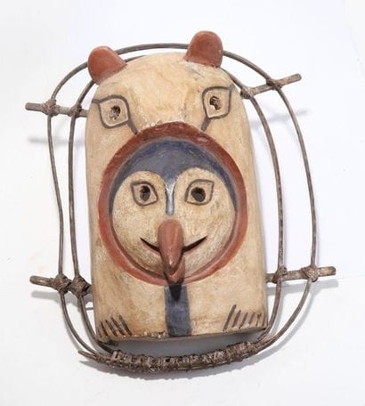 Anthropozoomorphic decorative mask with a...