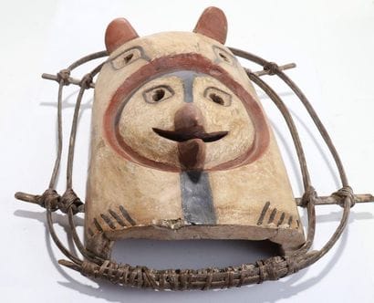 Anthropozoomorphic decorative mask with a...