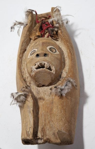 Decorative mask having a face with prominent...