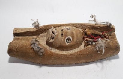 Decorative mask having a face with prominent...