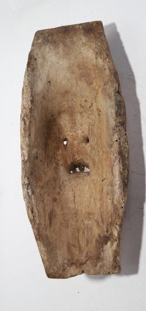 Decorative mask having a face with prominent...
