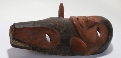Decorative double mask with a human face...