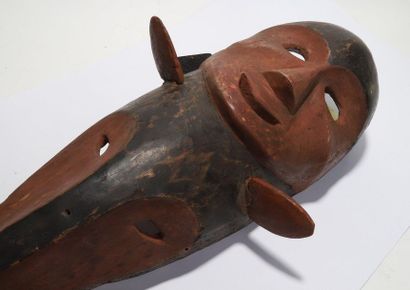 Decorative double mask with a human face...