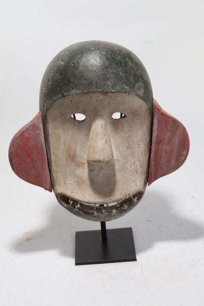 Anthropozoomorphic decorative mask with a...