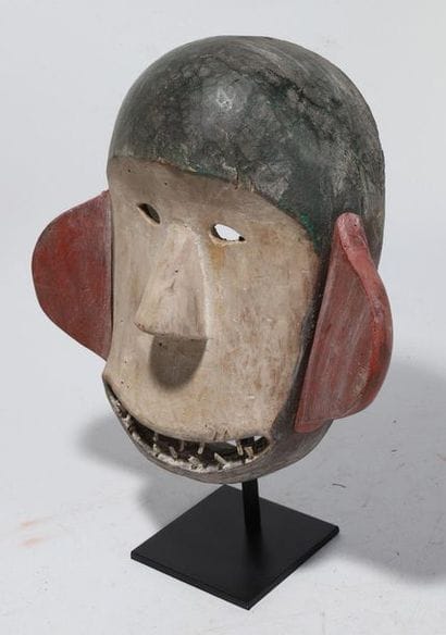 Anthropozoomorphic decorative mask with a...