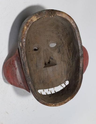 Anthropozoomorphic decorative mask with a...