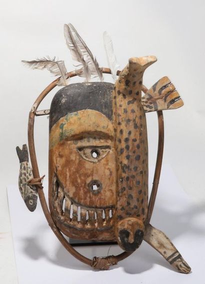 Anthropozoomorphic decorative mask with a...