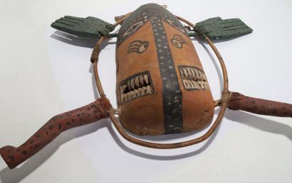 Anthropomorphic decorative mask with a rectangular...