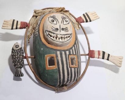 Anthropomorphic decorative mask with a round...