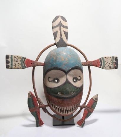 Anthropomorphic decorative mask with an oval...