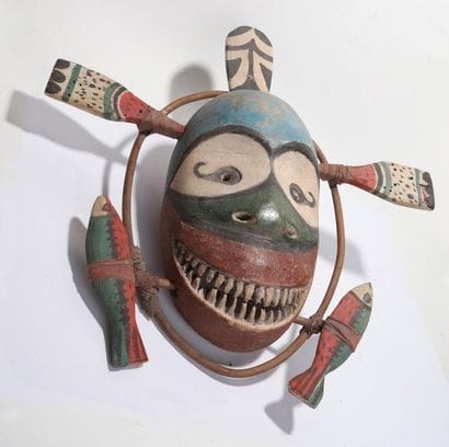Anthropomorphic decorative mask with an oval...
