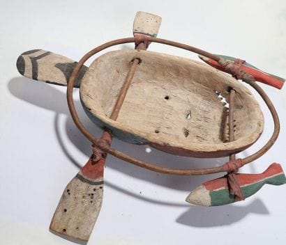 Anthropomorphic decorative mask with an oval...