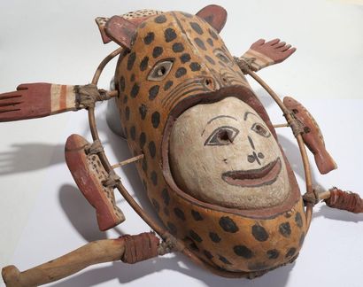 Anthropozoomorphic decorative mask with a...