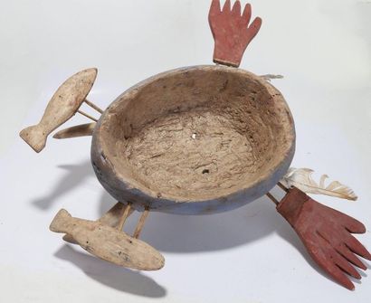 Decorative anthropomorphic mask with an oval...
