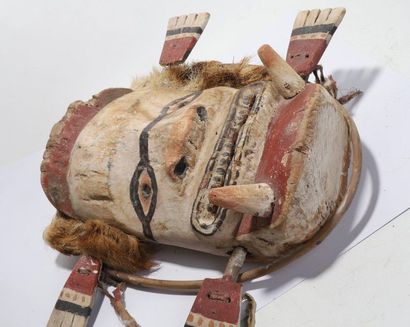 Anthropomorphic decorative mask with an oval...