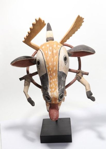Stylized decorative zoomorphic mask with...