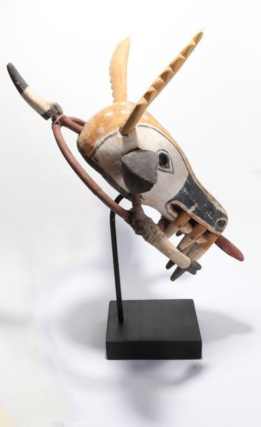 Stylized decorative zoomorphic mask with...