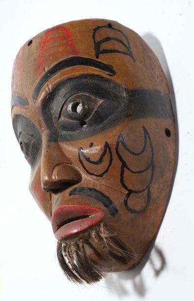 Decorative anthropomorphic mask with a man's...