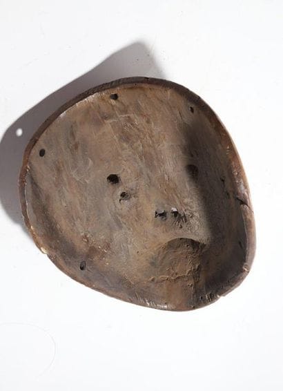 Decorative anthropomorphic mask with a man's...