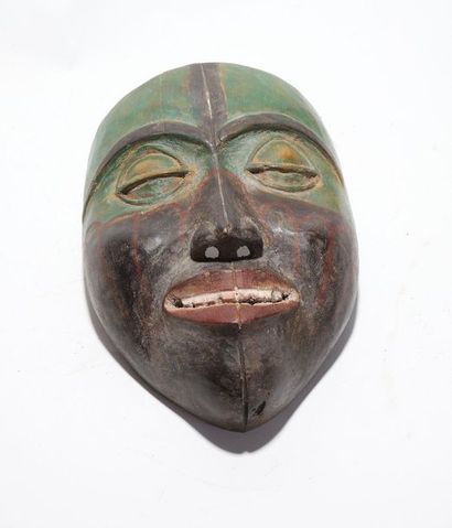Anthropomorphic decorative mask with a face,...