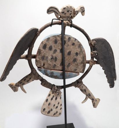 Decorative zoomorphic mask with a raptor...