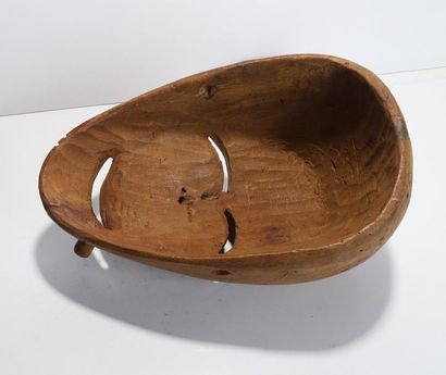 Anthropomorphic decorative mask with a smiling...