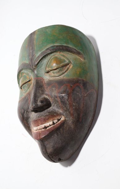 Anthropomorphic decorative mask with a face,...