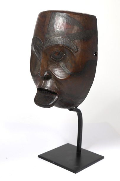 Anthropomorphic mask with a face with deeply...