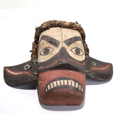 Anthropozoomorphic decorative mask with a...