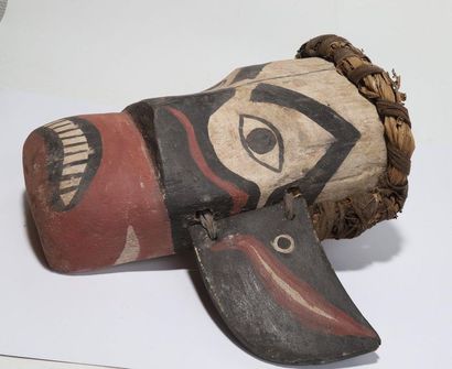 Anthropozoomorphic decorative mask with a...