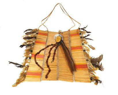 Pectoral made of oblong bone beads connected...