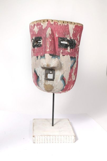 Mask made of light polychrome wood with pink...