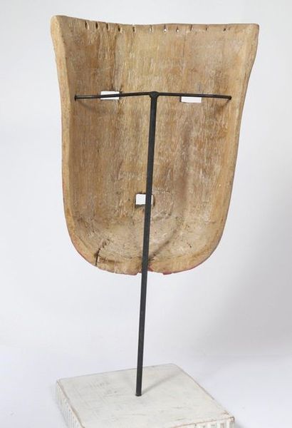 Mask made of light polychrome wood with pink...