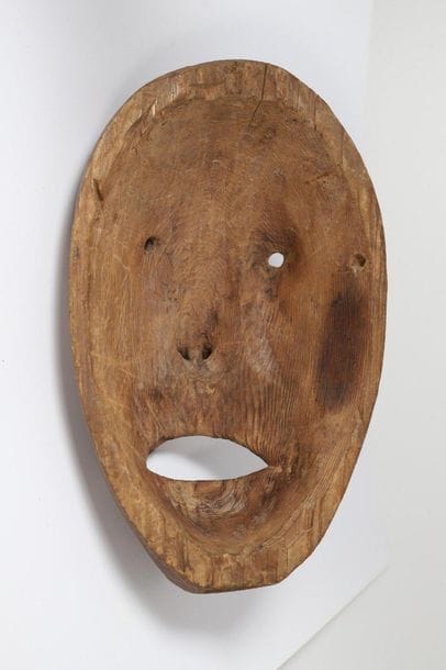 Mask with a sculpted human face, high cheekbones,...