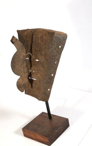Mask with a trapezoid-shaped face and extremely...