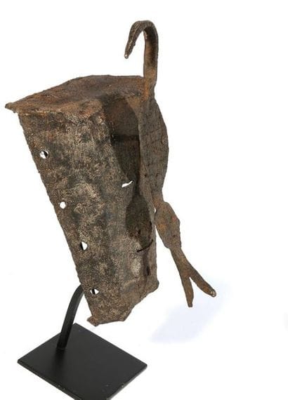 Mask related to funeral rites and worn by...