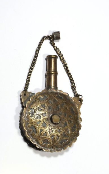 Brass or copper flask, round in shape, with...
