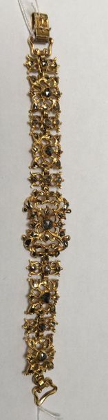 BRACELET articulé en or jaune 18k (750/°°)...