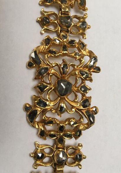 BRACELET articulé en or jaune 18k (750/°°)...