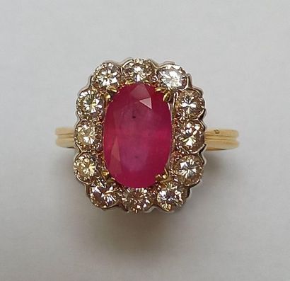 BAGUE en or jaune et gris 18K (750/°°) sertie...