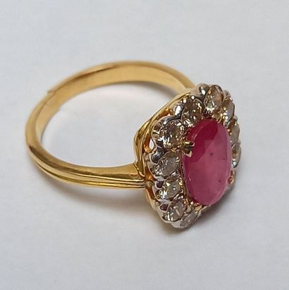 BAGUE en or jaune et gris 18K (750/°°) sertie...