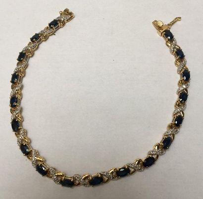 BRACELET en or jaune et or gris 18k (750/°°)...