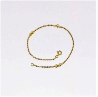 BRACELET en or jaune 18K (750/°°), maille...
