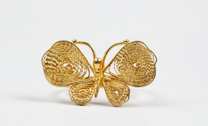 BAGUE en or jaune 18k (750/°°) centrée d'un...
