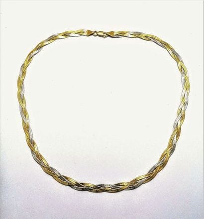 COLLIER en or 18K (750/°°), 3 ors tressés,...