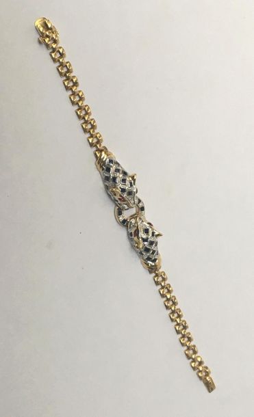 BRACELET en or jaune et or gris 18k (750/°°)...
