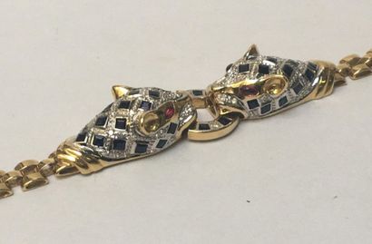 BRACELET en or jaune et or gris 18k (750/°°)...