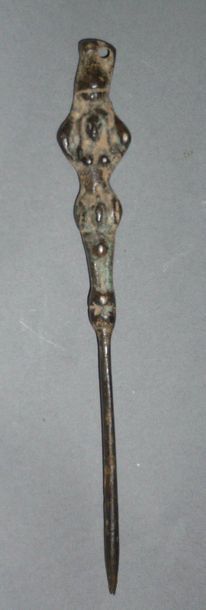 Bronze pin with a green patina in Roman style...