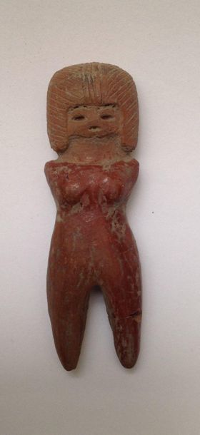 Female terracotta figurine with finely incised...